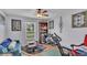 Home office or exercise room with a comfy couch and exercise equipment at 411 Sunfish Dr, Winter Haven, FL 33881