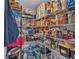 Well-stocked pantry with ample shelving for storage at 411 Sunfish Dr, Winter Haven, FL 33881