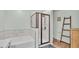 Clean bathroom with bathtub, shower, and modern finishes at 411 Sunfish Dr, Winter Haven, FL 33881