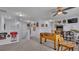 Spacious game room features foosball table and other games at 411 Sunfish Dr, Winter Haven, FL 33881