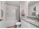 Bathroom with tub, single vanity, and granite countertop at 1250 Chester Ave, Haines City, FL 33844