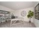Home office with a desk, bookshelves, and window at 1250 Chester Ave, Haines City, FL 33844