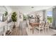 Farmhouse style dining room with wooden table and chairs at 1258 Chester Ave, Haines City, FL 33844