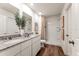 Modern bathroom with granite countertops, double sinks, and a shower/tub combo at 1261 Chester Ave, Haines City, FL 33844