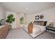 Spacious bedroom with plush bedding and large window overlooking the backyard at 1261 Chester Ave, Haines City, FL 33844