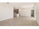 Open concept dining room with tile floors and kitchen island at 2350 Selenia St, Lake Alfred, FL 33850