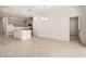Open concept dining room with tile floors and kitchen view at 2350 Selenia St, Lake Alfred, FL 33850