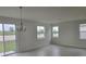 Bright dining room with access to the backyard at 2363 Selenia St, Lake Alfred, FL 33850