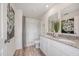 Modern bathroom with double vanity and granite countertops at 1001 Ambleside Dr, Haines City, FL 33844