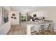 Modern kitchen with granite countertops and island at 2235 Majestic Span Ave, Eagle Lake, FL 33839