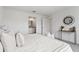 Bright bedroom with ensuite bathroom access and modern decor at 1017 Ambleside Dr, Haines City, FL 33844