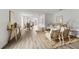 Bright and airy living room with hardwood floors and neutral decor at 2211 Majestic Span Ave, Eagle Lake, FL 33839