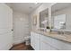 Bathroom boasts double vanity and a shower at 2211 Majestic Span Ave, Eagle Lake, FL 33839
