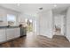 Modern kitchen with stainless steel appliances and granite countertops at 2211 Majestic Span Ave, Eagle Lake, FL 33839