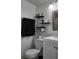 Simple bathroom with floating shelves and white vanity at 833 Sky Lake Cir # A, Orlando, FL 32809