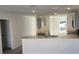 Kitchen features gray cabinets, granite countertops, and breakfast bar at 1412 Swan Ct, Poinciana, FL 34759