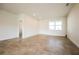 Spacious living room with tile flooring and neutral color palette at 802 Fraser Dr, Poinciana, FL 34759
