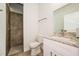 Clean bathroom with granite vanity and walk-in shower at 802 Fraser Dr, Poinciana, FL 34759