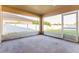 Spacious screened patio overlooking backyard at 8021 Princeton Manor Cir, Lakeland, FL 33809