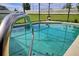 Inviting screened-in pool area, perfect for relaxation at 15718 Heron Hill St, Clermont, FL 34714