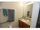 Bathroom with single vanity and grab bars at 2033 Estancia Cir # B, Kissimmee, FL 34741