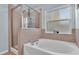 Bathroom with shower and garden tub at 2513 Brownwood Dr, Mulberry, FL 33860