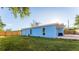 Spacious backyard with a large grassy area at 2203 Nottingham Rd, South Daytona, FL 32119