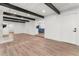 Open living space with hardwood floors and kitchen view at 2203 Nottingham Rd, South Daytona, FL 32119