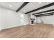 Living room with fireplace and exposed beams at 2203 Nottingham Rd, South Daytona, FL 32119