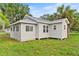 Renovated home showcasing a rear view and side yard at 2743 Fletcher Ave, Eaton Park, FL 33840