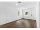 Spacious bedroom featuring hardwood floors and large windows at 4251 Tangerine Ave, Sanford, FL 32773