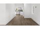 Clean and bright hallway leading to the kitchen and living areas at 4251 Tangerine Ave, Sanford, FL 32773