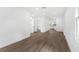 Open living room with hardwood floors and kitchen views at 4251 Tangerine Ave, Sanford, FL 32773