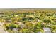 Aerial view of the neighborhood, showcasing surrounding homes and trees at 4251 Tangerine Ave, Sanford, FL 32773