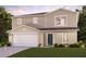 Two-story house with a two-car garage and landscaping at 1405 Stuart Ln, Poinciana, FL 34759