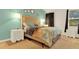 Cozy bedroom with a comfortable bed and unique decor at 5240 Oakbourne Ave, Davenport, FL 33837