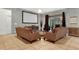 Gathering room featuring comfortable seating and a large projection screen at 5240 Oakbourne Ave, Davenport, FL 33837