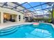 Inviting pool and patio area with spacious deck at 5240 Oakbourne Ave, Davenport, FL 33837