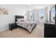 Well-lit bedroom with a double bed and plenty of storage at 791 Terrapin Dr, Debary, FL 32713
