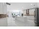 Spacious kitchen with a large island and white cabinetry at 791 Terrapin Dr, Debary, FL 32713