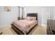 Cozy bedroom featuring a comfortable bed and ample closet space at 791 Terrapin Dr, Debary, FL 32713