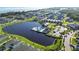 Aerial view of community with lake and pool at 791 Terrapin Dr, Debary, FL 32713