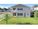 Two-story house with backyard, deck and grassy area at 791 Terrapin Dr, Debary, FL 32713