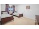 Cozy bedroom with two twin beds and ample natural light at 791 Terrapin Dr, Debary, FL 32713