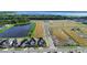 Aerial view of new houses and lake at 791 Terrapin Dr, Debary, FL 32713