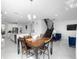 Kitchen features a lovely dining area with a wood table and chairs at 791 Terrapin Dr, Debary, FL 32713