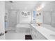 Elegant bathroom with soaking tub, walk-in shower, and double vanity at 791 Terrapin Dr, Debary, FL 32713