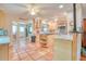 Spacious kitchen with island, granite countertops, and stainless steel appliances at 6269 Se 125Th Pl, Belleview, FL 34420