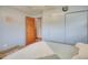 Serene bedroom with light gray walls and a comfy bed at 6269 Se 125Th Pl, Belleview, FL 34420