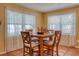 Cozy dining area with wooden table and chairs at 6269 Se 125Th Pl, Belleview, FL 34420